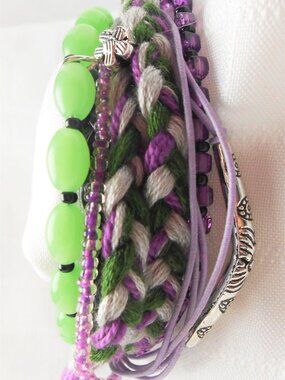 Handmade bracelet with rows of threads, beads, and charms No. 220